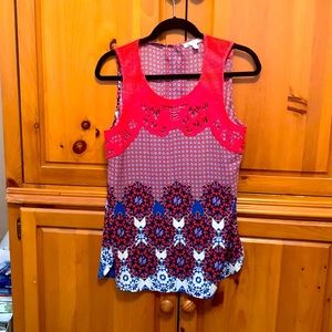 Pretty sleeveless top.  Great to wear with white jeans